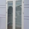 Cửa đi nhôm xingfa 2 cánh màu trắng